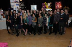 Ocean Atlantic Sotheby's International Realty turned out in large numbers for the Mardi Gras Gala. Shown in back are (l-r) Donna Connelly, Dustin Oldfather, Brian Barrows, Kim Hamer, Kelly Banett, Kathleen Archino, Justin Healy, Liz Barnhart, Ann Cunningham, Preston Schell, Kathleen Archino, Jennifer Nagle, Chuck Seaman and Vicki Tull. In front are Mariya Oldfather, Sandi Bisgood, Jenn Barros, Murphy Moyer, Kathy Garber, Susan Pomerantz, Brittany Danahy, Alina Stubbs, Kelly Walsh, Paul Maltaghati and Henry Jaffe. BY STEVEN BILLUPS