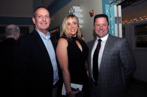 Happy to support the Children's Beach House are (l-r) Tim Winstead, and Corina and Richard Perez. BY STEVEN BILLUPS