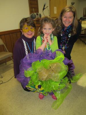 Erin Walls won the Lenten wreath door prize. Shown are (l-r) Rose Marie Patin, Erin Walls and her mother Ellie Walls. SOURCE SUBMITTED