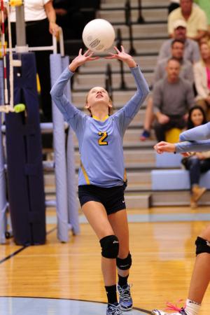 Sophomore setter Mallory Jones gets an assist. BY DAN COOK