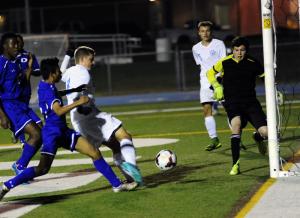Cape senior jack Ashby shoots and scores. BY DAN COOK