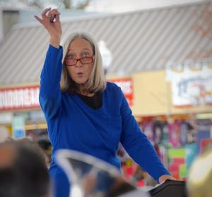 Rehoboth Concert Band conductor Sharon Still leads the band during an outdoor concert at the Rehoboth Beach Bandstand. BY RON MACARTHUR