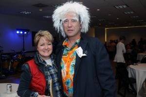 Tracy Tull, left, Delaware Hospice vice president of compliance and education, and Kevin Neilson stayed around after they went Back to the Future. BY STEVEN BILLUPS