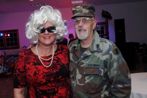 Bev Crowl, public relations specialist, and Al Morris, transition coordinator, take a moment for a photo. BY STEVEN BILLUPS