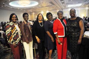 Helping celebrate First State's 50th Anniversary are (l-r) Karen Maull, Dana Paskins, Doris Parson, Sherita Belle, Waynne Paskins and the Rev. Belmont Burns. BY STEVEN BILLUPS