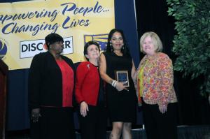 Nakeisha Holliman-Redmond received the Personal Achievement Award. With help from First State's Case Management program, Holliman-Redmond went from a low-paying waitress job to support her two children, to making a living wage as a medical technician. She had a degree from Kaplan University and its family resource coordinator and was referred to the Dept. of Labor and now makes a living wage in New Jersey. Shown are (l-r) Executive Director Bernice Edwards, Board President Peggy Strine, Holliman-Redmond and Board Vice President Anne Farley. BY STEVEN BILLUPS