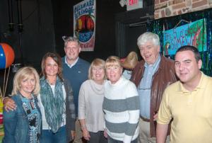 Lead sponsors Meinike of Lewes are thanked for supporting the library. Terri Colegrove, left, event coordinator; Meinike sponsors Jody Repass, Dave Repass, Donna Repass, Janice Shamp, Lee Repass, and Ed Goyda, Lewes Public Library Director enjoy the island themed event. BY DENY HOWETH