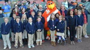 The Keenote Chorale sang at the Delmarva Shorebirds game April 16. Shown are in back (l-r) Brooke Webb, Claudia Little, Zoe Johnson, Brandon Morgan, Sherman the Shorebird mascot, Jessica Creigh, Johnna Argo (obscured), Candace Anderson,  and Maya Haldar. In the second row are Seth Mifflin, Claire Balliet, Jasper Isaacs, Colton Burrows, Priya Haldar, Harmony Perkins and Violet Reichert. In front are Aisling Carroll, Lincoln Hazel, Mackenzie Butler, Nadia Byle, Gracie Kneipp and Carli Burrow. SOURCE SUBMITTED
