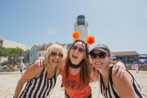 Referees (l-r) Benita Jenkins, Lillian Donahue and Diana Austin celebrate during the Restaurant Olympics.