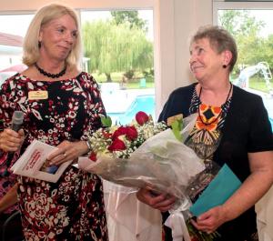 Jo Allegro-Smith, CSC Sussex County director, left, presents Kaye Webb, Sussex County program coordinator a recognition of her service with the Cancer Support Community in Sussex County. She has been working on behalf of CSC Sussex County for more than 10 years, longer than there has been an office in Sussex County.