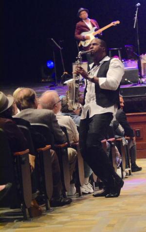 It didn’t take long for the energetic saxophonist Eric Darius to get out into the crowd at Cape Henlopen High School on opening night. RON MACARTHUR PHOTO