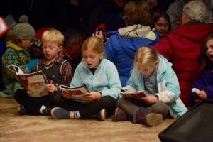 Young carolers have the best seat in the house during the Rehoboth Beach tree-lighting event. RON MACARTHUR PHOTO