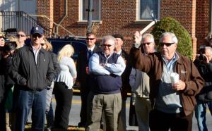 As other mayors and spectators look on, Ocean View Mayor Walt Curan throws the winning hatchet toss. RON MACARTHUR PHOTO