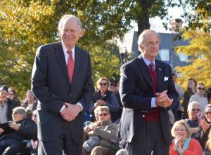 Former Delaware congressman and governor Mike Castle, left, walks along the parade route with Sen. Tom Carper. RON MACARTHUR PHOTO