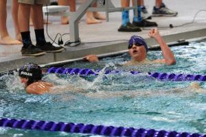 Seahawk Evan Davis celebrates his win in the 200 free. DAN COOK PHOTO