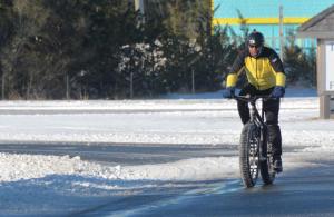 John Spieker of Lewes heads out for a long ride to Rehoboth Beach along the coast and back. He also went for a ride during the storm the day before. RON MACARTHUR PHOTO