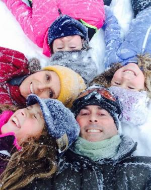 Keeping warm with love and laughter are (clockwise) Mark, photographer; Brianna, 9, Roxanne, mom; Samantha, 13; and Celina, 9.