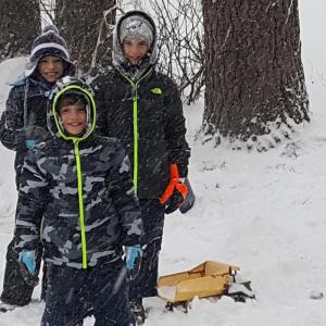 Ryan Gilbert, 11, Austin Gilbert, 10, and Jayden Gilbert, 8, loved are their snow day. The trio played with dump trucks and tackled each other. Photo submitted by Nicole Wooters.
