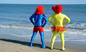 Larry Evans of Milford, left, and Robb Dunne of Ocean City strike a pose before jumping in the ocean.