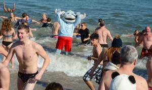 Wilmington Blue Rocks mascot Rocky Bluewinkle gets into the spirit of the event celebrating the plunge.
