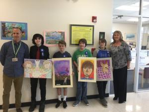Rehoboth Art League winners pose with their artwork. Shown are (l-r) Beacon art teacher Alexander Louvis, Gwena Wiegmann, Will Kelleher, Nolan Hilton, Pat Brockaway and County Bank Manager Sandra Walker. SUBMITTED PHOTO