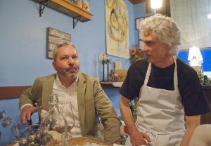 Richard Smock, wines sales manager at Kinsella, left, and Chef Richard Davis talk about the pairings.