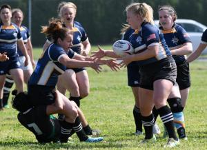 Kori Seidel, left, of the Lehigh Valley Hooligans passes to teammate Nicole Volk in the 19-19 tie with Chesapeake. DAN COOK PHOTO