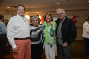 Event organizers gathered for a photo at the event. Shown are (l-r) Board President John Wolfle, Event Committee Member Roberta Wuttke, Event Co-Chair and Board Member Lana O’Hollaren, and Event Co-Chair and Board Member Bob Yesbek. Top Chef