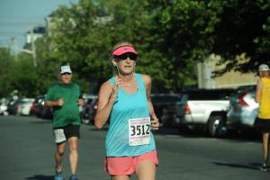 Mary Andrisani gets across the line in 30:14. DAVE FREDERICK PHOTO