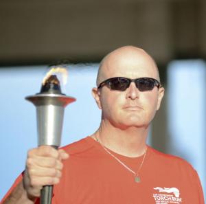 Sgt. Barry Wheatly of Millsboro Police Department carried the flame for the first leg of the run.