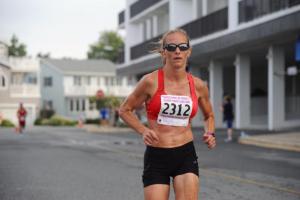 Rachel Booth is the first woman home in 18:10.