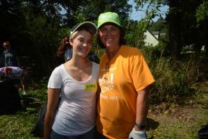 SCHFH Neighborhood Revitalization Coordinator Audrey Miller, left, stands with her mother and volunteer Dana Miller. Rock the Block