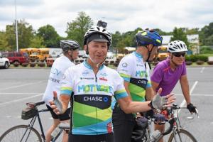 Jack Markell is all smiles after arriving at Cape Henlopen High School in Lewes to pick up a few more riders for the final leg. NICK ROTH PHOTO