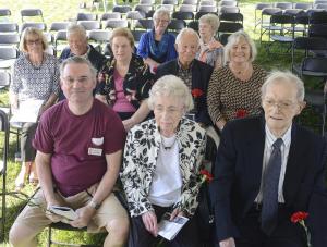 Gathering for a photograph are some who have been church members for at least 50 years. Shown in back are (l-r) Barbara Brittingham and Lois Shelley. In the middle row are Joan Palmer, Bill Lee, Paula Simpson, and Richard and Anne Lynam. In front are Chuck Mitchell, and Signa and John Souder.