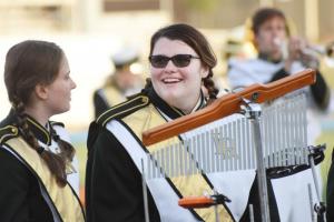 Indian River pit members Jessica Beaston, left, Natalie Wells are all smiles before the performance.