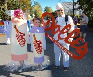 The Newman family of Lancaster, Pa., has one of the most localized costumes, dressed as Dolle’s taffy. They are (l-r) Kim, Madeline and Tony. RON MACARTHUR PHOTO
