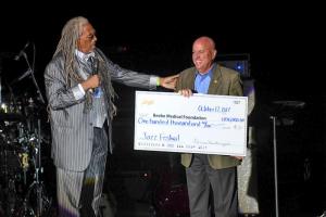 Jazz fest emcee Perky Scott is shown with Beebe Medical Foundation Vice President of Development Tom Protack. The 28th Annual Rehoboth Beach Jazz Festival supports the Tunnell Cancer Center.