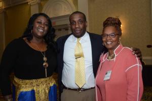 Family resource coordinators (l-r) Ronnie Quinn, Anthony Williams and Rosalyn Winder smile for the camera. FSCAA 52nd