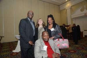 Community Partner Award recipient Delmarva Power employees gather for a photo. Shown are (l-r) Vice President John Allen, Cindy Ventresch, and Danielle Wright. In front is Keith Campbell. FSCAA 52nd