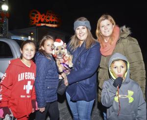 The pup Reggie Martincavage is dressed for the occasion while visiting Rehoboth with (l-r) Addison, Riley, Suzanne, Rachele and Brayden Ginn.