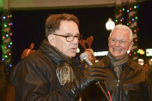 Counting down the lighting of the tree are Bill Graff, left, and Jeff Schuck.