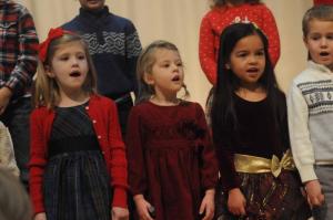 Singing “Go Tell It on the Mountain” loud and clear are (l-r) Kellen Oswald, Vida Monroe, Alicia Parsons and Andrew Mekulski from the 4-year-old Owls class. Epworth Christmas