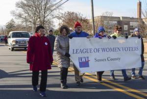 The League of Women Voters of Sussex County powered through the cold temperatures for the celebration.