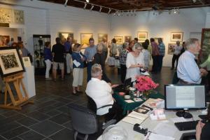 A nice crowd gathers in the Corkran Gallery for the opening. RAL Opening reception