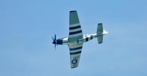 The stripes painted on this P-51 Mustang were painted on the bottoms of all Allied planes in World War II to let Allied soldiers know they were friendly.