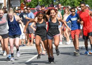 Winning the Kids Game three-legged race for the 11th year in a row were Washington, D.C residents Naiya Mainigi, 15, left, and her partner Sonia Walke, 14.