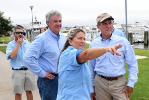 Indian River Inlet Marina Manager Theresa Mosier shows Gov. John Carney an area of concern as Delaware Seashore Parks’ Scott Borino, left, and DNREC Secretary Shawn Garvin look on. DAN COOK PHOTO