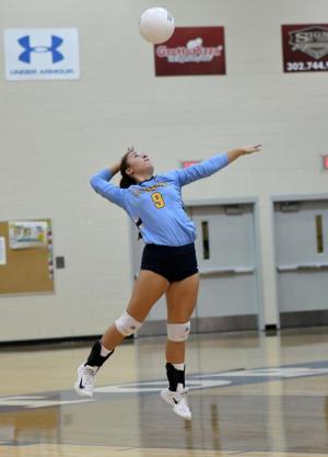 Cape’s Abbey Derrickson slams one of her four aces in the victory over Dover.