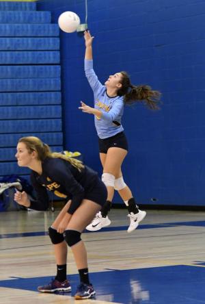Junior setter Abbey Derickson served 10 straight points to end the fifth set.