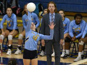 Sophomore Erin Morrissey powers in one of her 13 kills.